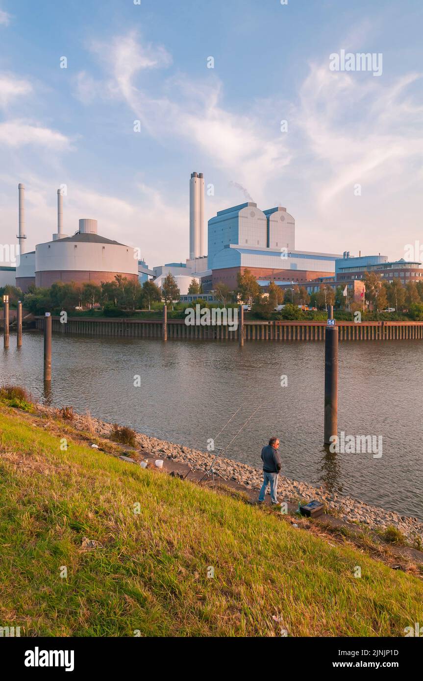 Tiefstack Power Station with angler, Germany, Hamburg Stock Photo