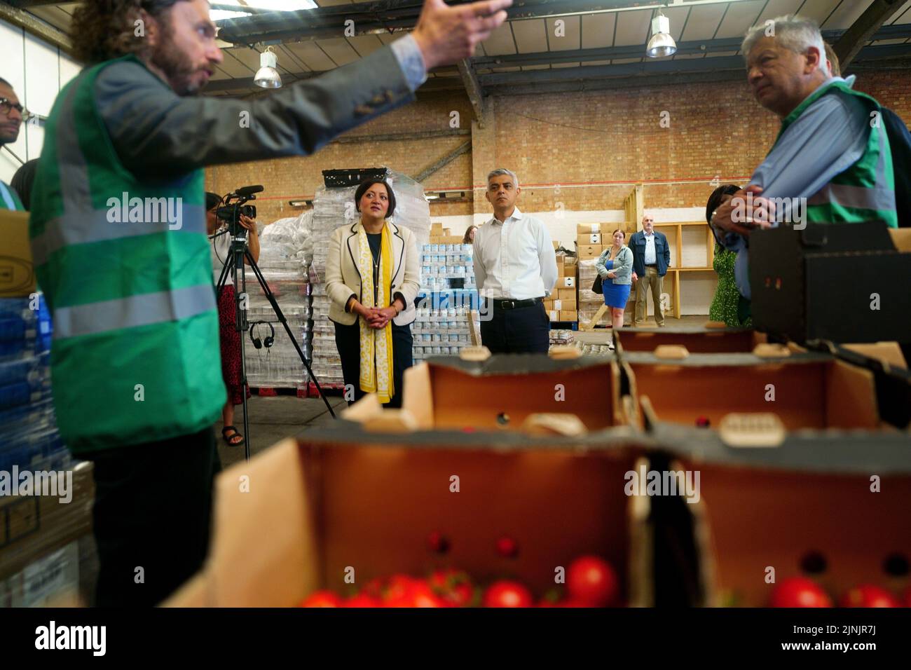 The Mayor of London, Sadiq Khan, during a visit to the Newham Food Alliance warehouse hub in North Woolwich. The hub, which is run by Newham council, collects food and then delivers it to foodbanks across the borough.Picture date: Friday August 12, 2022. Stock Photo