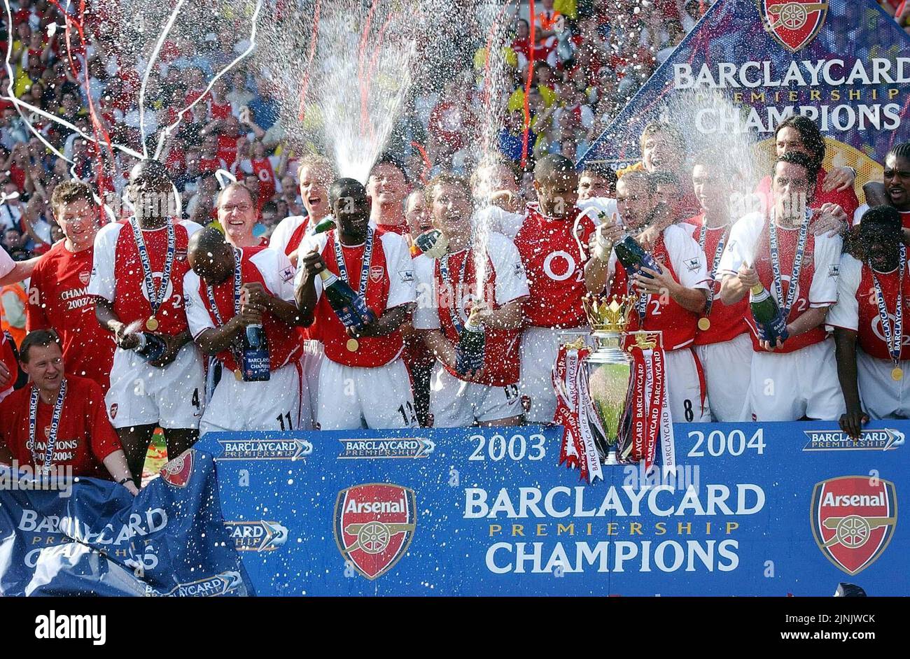 File photo dated 15-05-2004 of Arsenal players celebrating victory in the Premier League. Only the 'Arsenal Invincibles' have completed a season unbeaten with Arsene Wenger's side producing 26 wins and 12 draws in the 2003-04 campaign. By doing so, they matched the top-flight achievements of Preston who were undefeated in the 1888-89 season. Issue date: Friday August 12, 2022. Stock Photo
