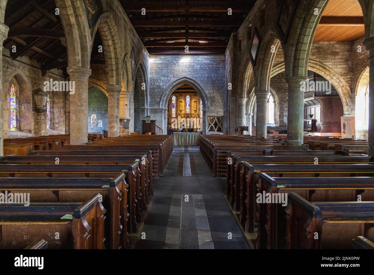 The interior of the 12th Century church of St Aidan at Bamburgh, Northumberland, England Stock Photo
