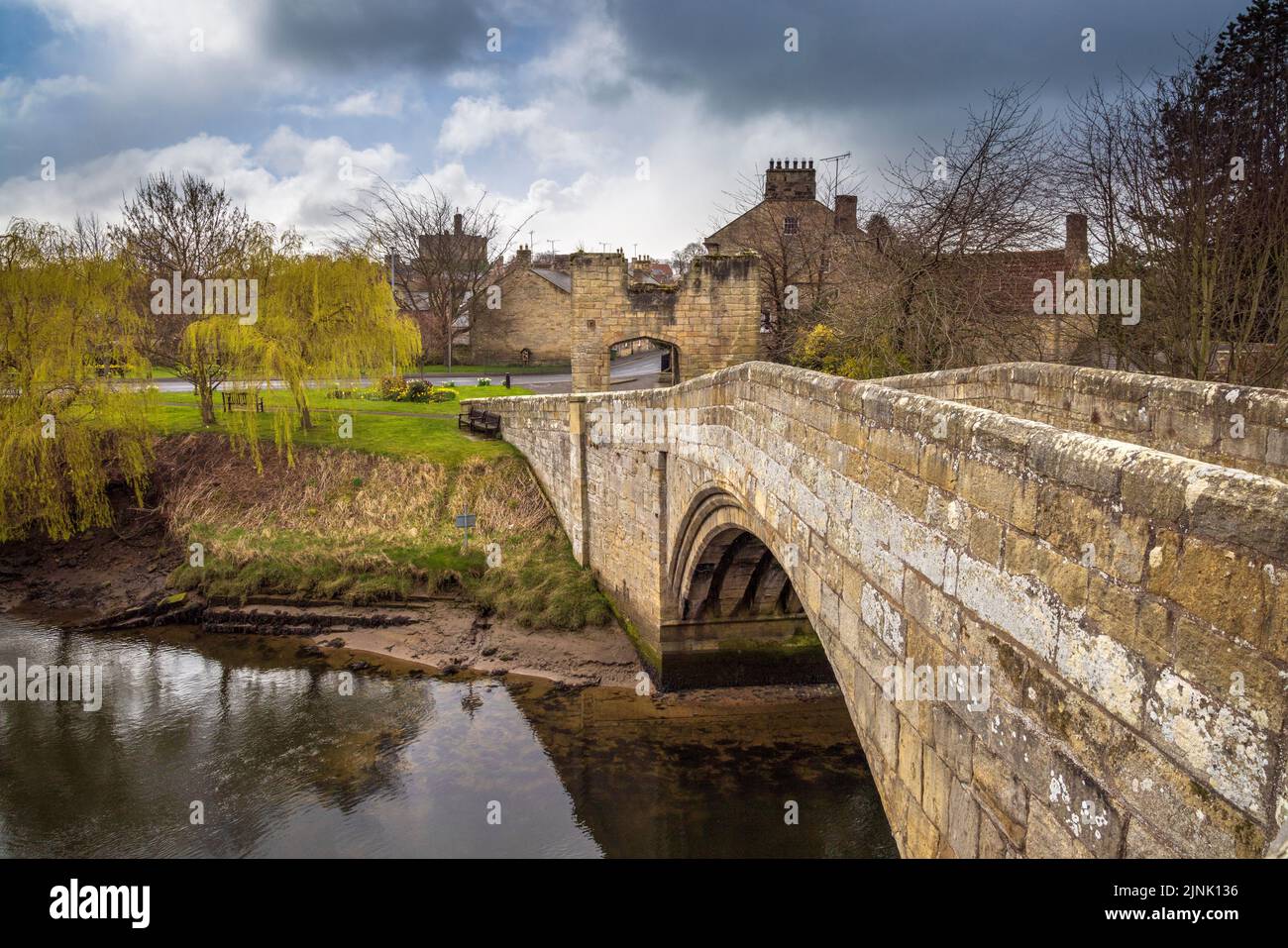 The old 14th century Warkworth bridge over the Coquet River on the Northumberland Coast Path, Warkworth, Northumberland, England Stock Photo