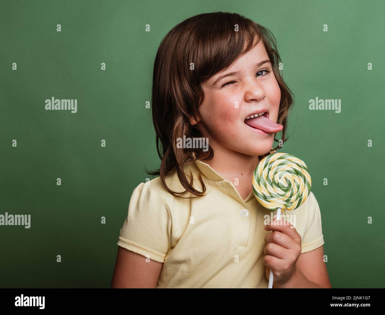 candy, childhood, lollipop, sticking out tongue, candies, childhoods, children, kid, kids, lollipops, poking tongues, sticking out tongues Stock Photo