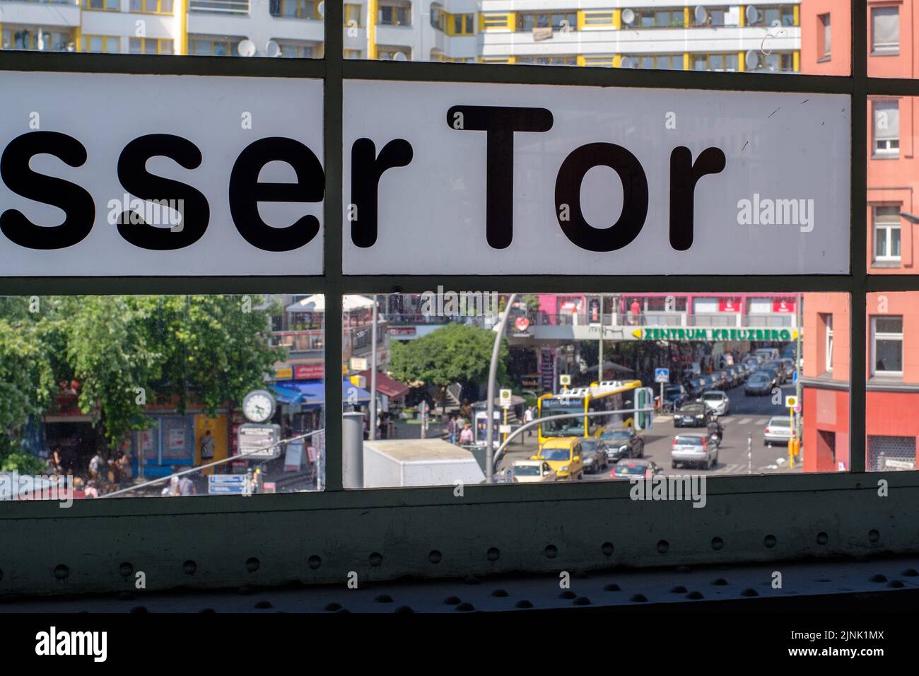 BERLIN, GERMANY - JUNE 9, 2018: View past the Kottbusser Tor station sign in the Kreuzberg area of Berlin, Germany on June 9, 2018. Stock Photo