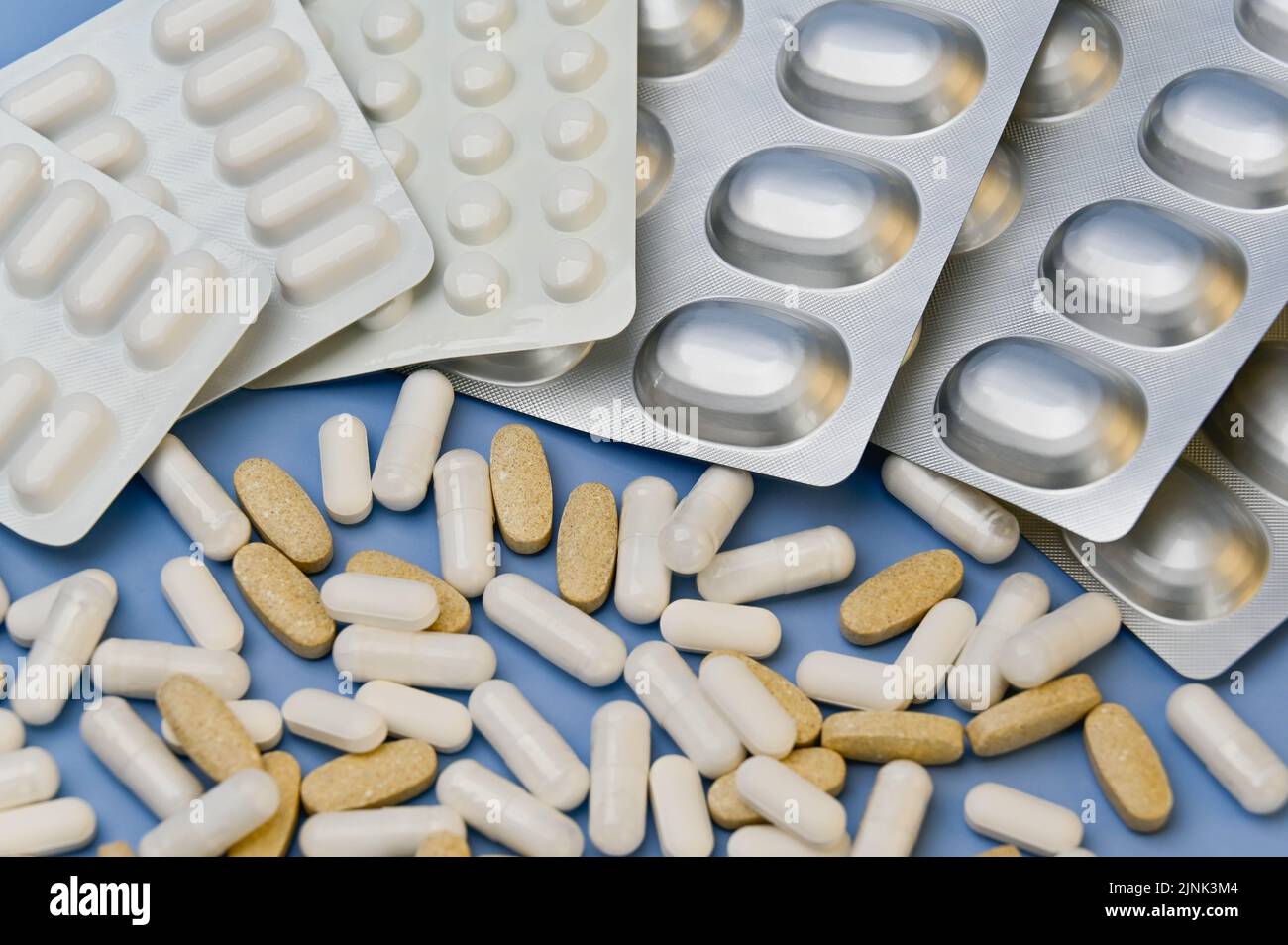 Assorted loose Vitamins tablets supplements medication and blister