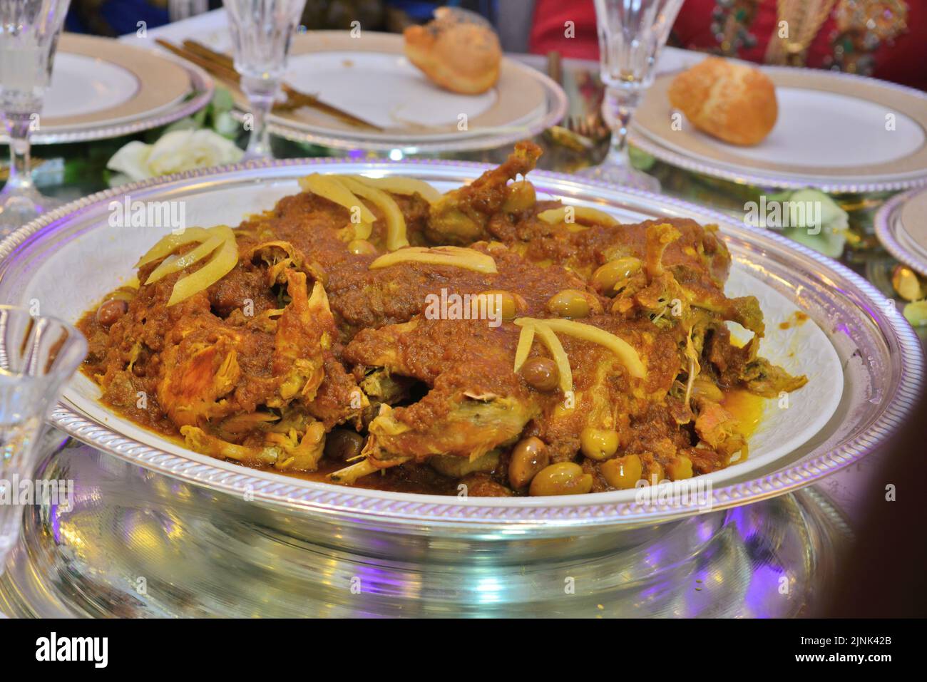 Moroccan-style chicken with olives and lemon. Served as a main dish at weddings Stock Photo