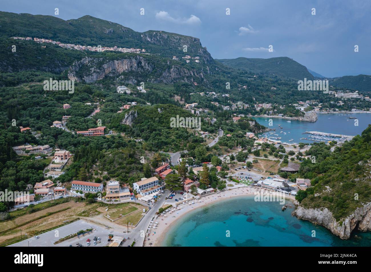 Drone view of Palaiokastritsa famous resort town with Agios Spyridonas beach on Greek Island of Corfu Stock Photo