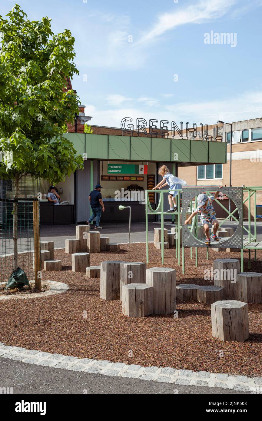 Street food market and playground. Greenhill Place, Harrow, United Kingdom. Architect