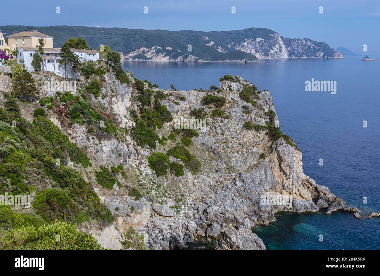 Aerial view from mountain in Palaiokastritsa famous resort town on Greek Island of Corfu, Monastery on the left side Stock Photo