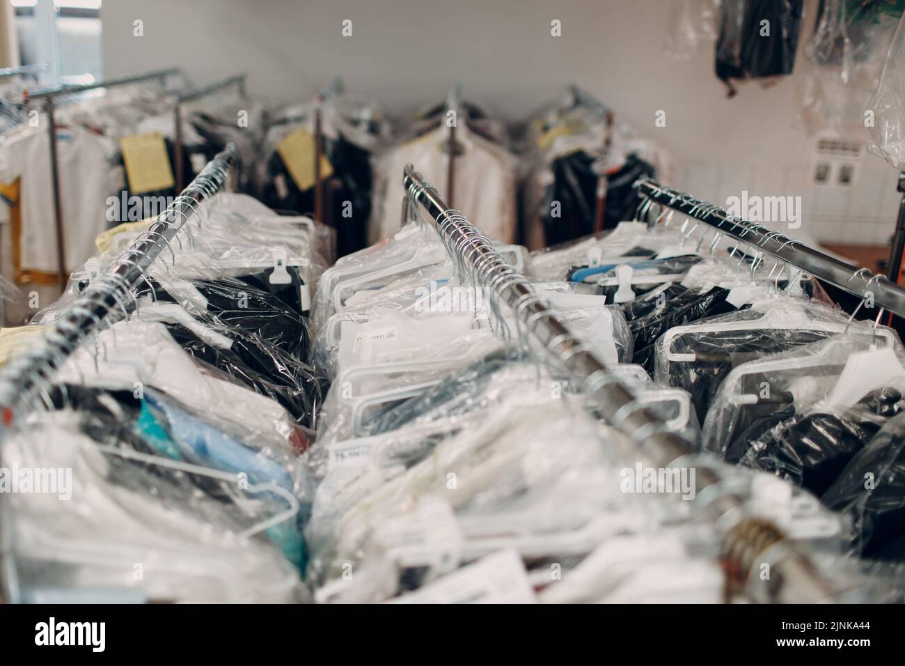 Dry cleaning clothes. Clean cloth chemical process. Laundry industrial