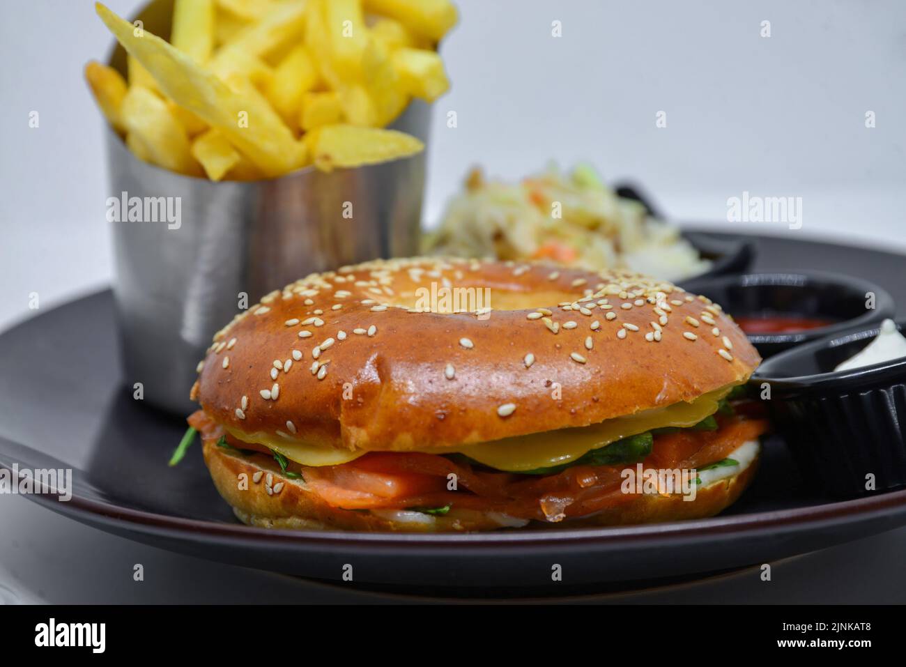 fast food menu. hamburger, french fries and salad. burger with beef stake, cheese and pickle