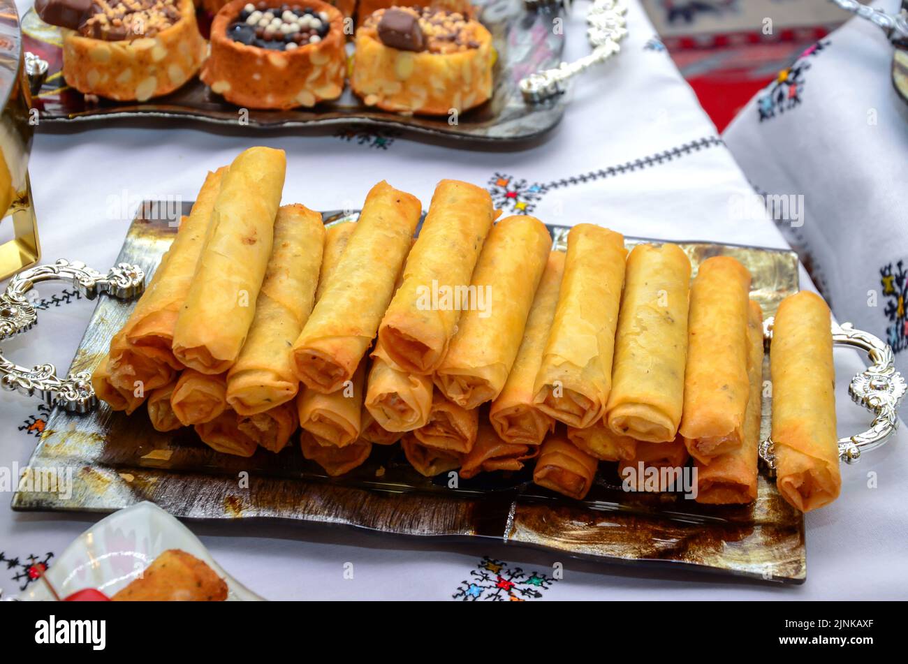 Moroccan salty and sweet appetizers are served at weddings and birthdays. The concept of cooking in Morocco Stock Photo