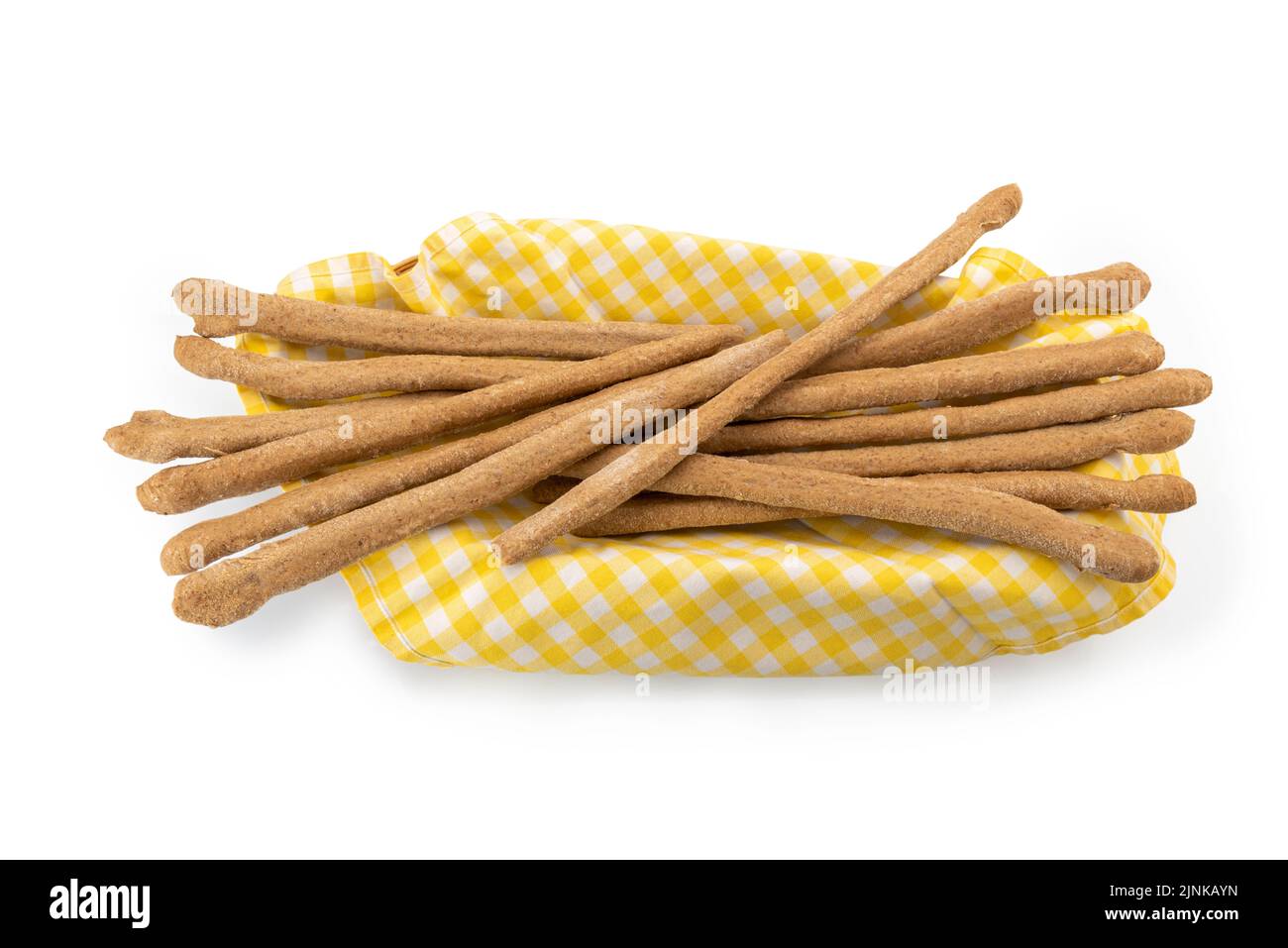 Breadsticks hand stretched (stirati a mano, in italian) on napkin yellow and white checkered, typical crunchy Turin baked breadsticks made of wholemea Stock Photo