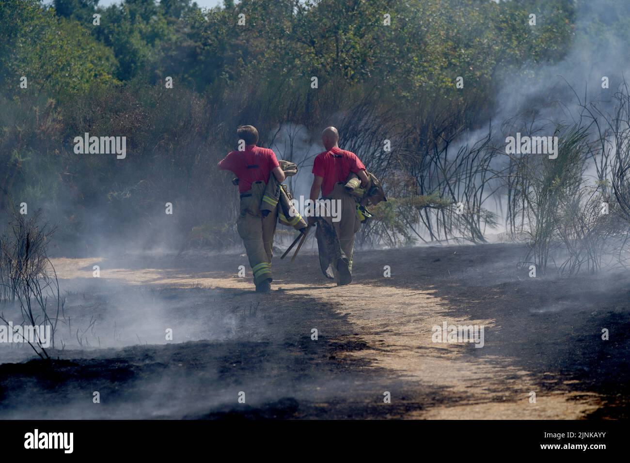 Firefighters arrive at the scene of a grass fire on Leyton flats in east London, as a drought has been declared for parts of England following the driest summer for 50 years. Picture date: Friday August 12, 2022. Stock Photo
