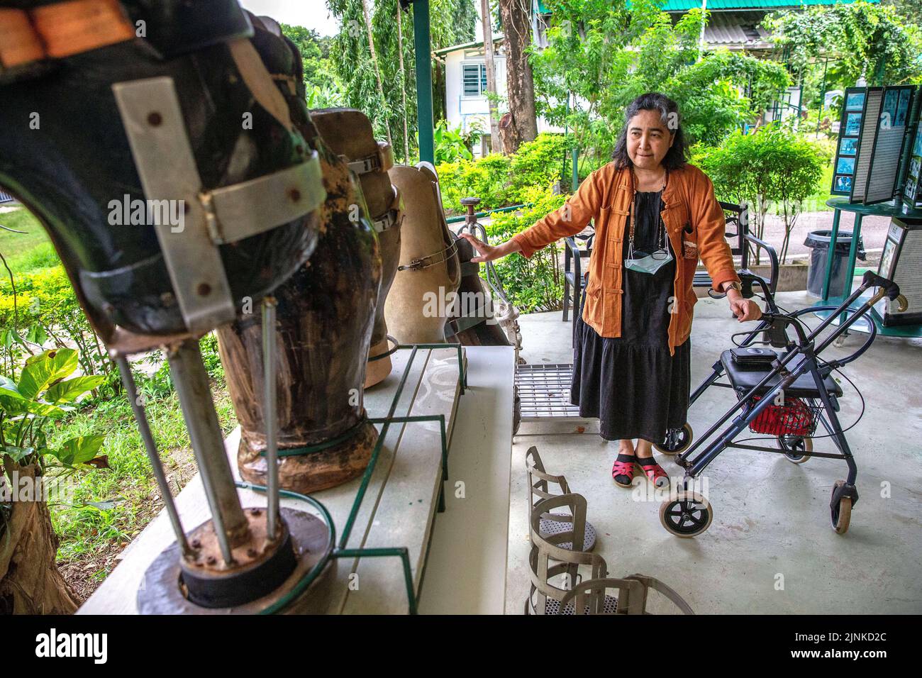 (220812) -- LAMPANG, Aug. 12, 2022 (Xinhua) -- Soraida Salwala introduces prosthetic legs made for elephants at the 'Friends of the Asian Elephant' elephant hospital in Lampang, Thailand, on Aug. 6, 2022.  Deep in the forest of Lampang province in northern Thailand, the hospital, named Friends of the Asian Elephant (FAE), is the first hospital in the world dedicated to treating injured elephants.   Since its establishment in 1993, the hospital has saved more than 5,000 elephants with illnesses varying from diarrhoea to eye diseases and injuries through car accidents or mine explosions.   TO GO Stock Photo