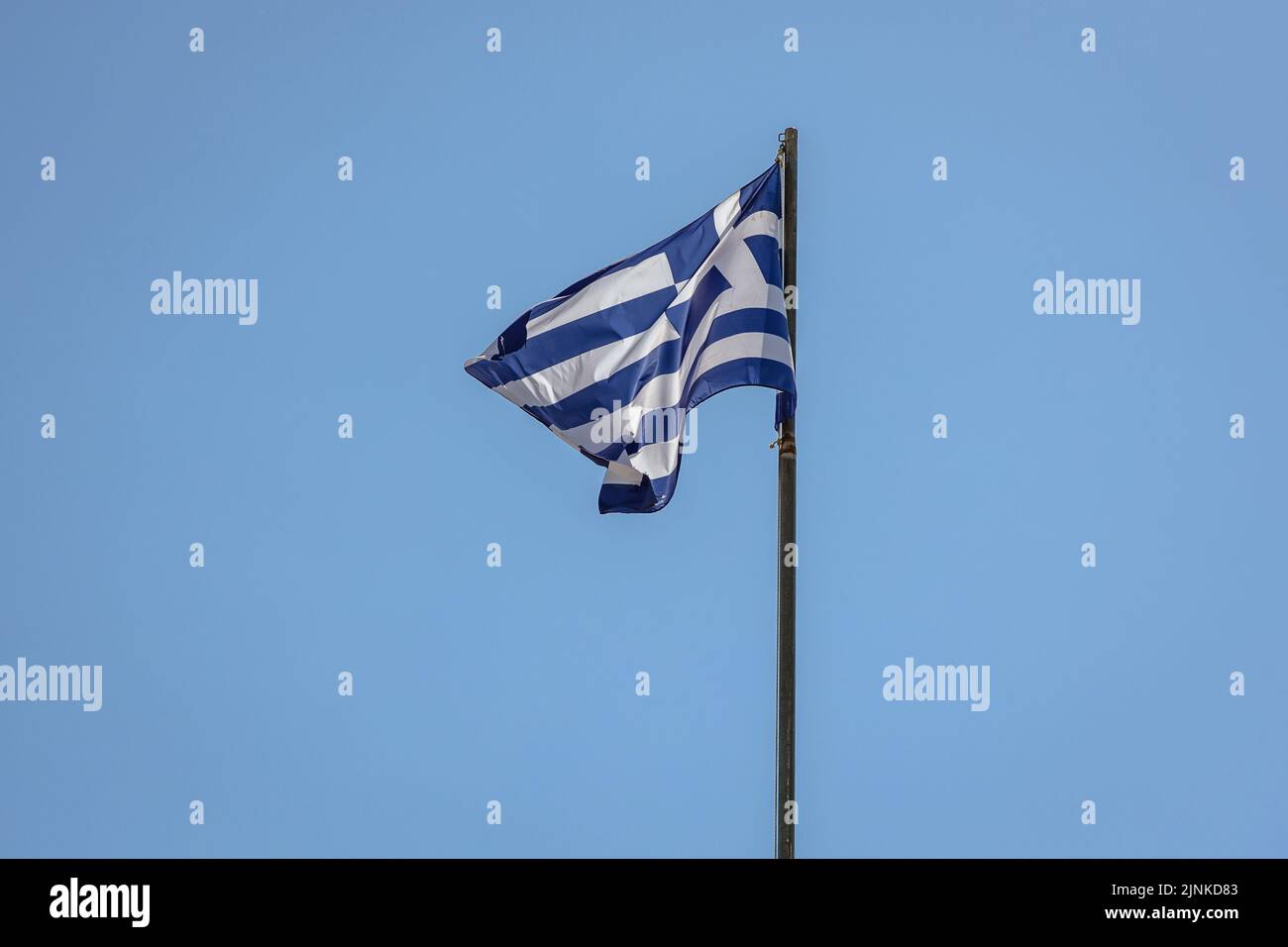 Flag of Greece in Old Venetian Fortress in Corfu town on a Greek island of Corfu Stock Photo