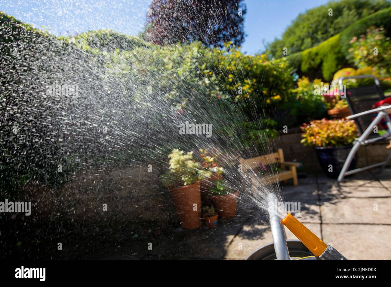 Halifax, West Yorkshire, UK. 12th Aug, 2022. A hose pipe in a West