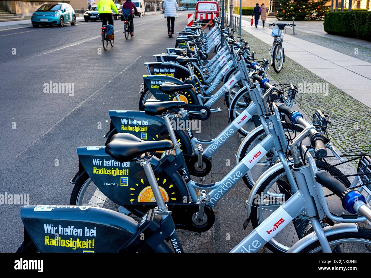 Electric Rental Bikes At A Charging Station In Front Of The Berlin House Of Representatives Stock Photo
