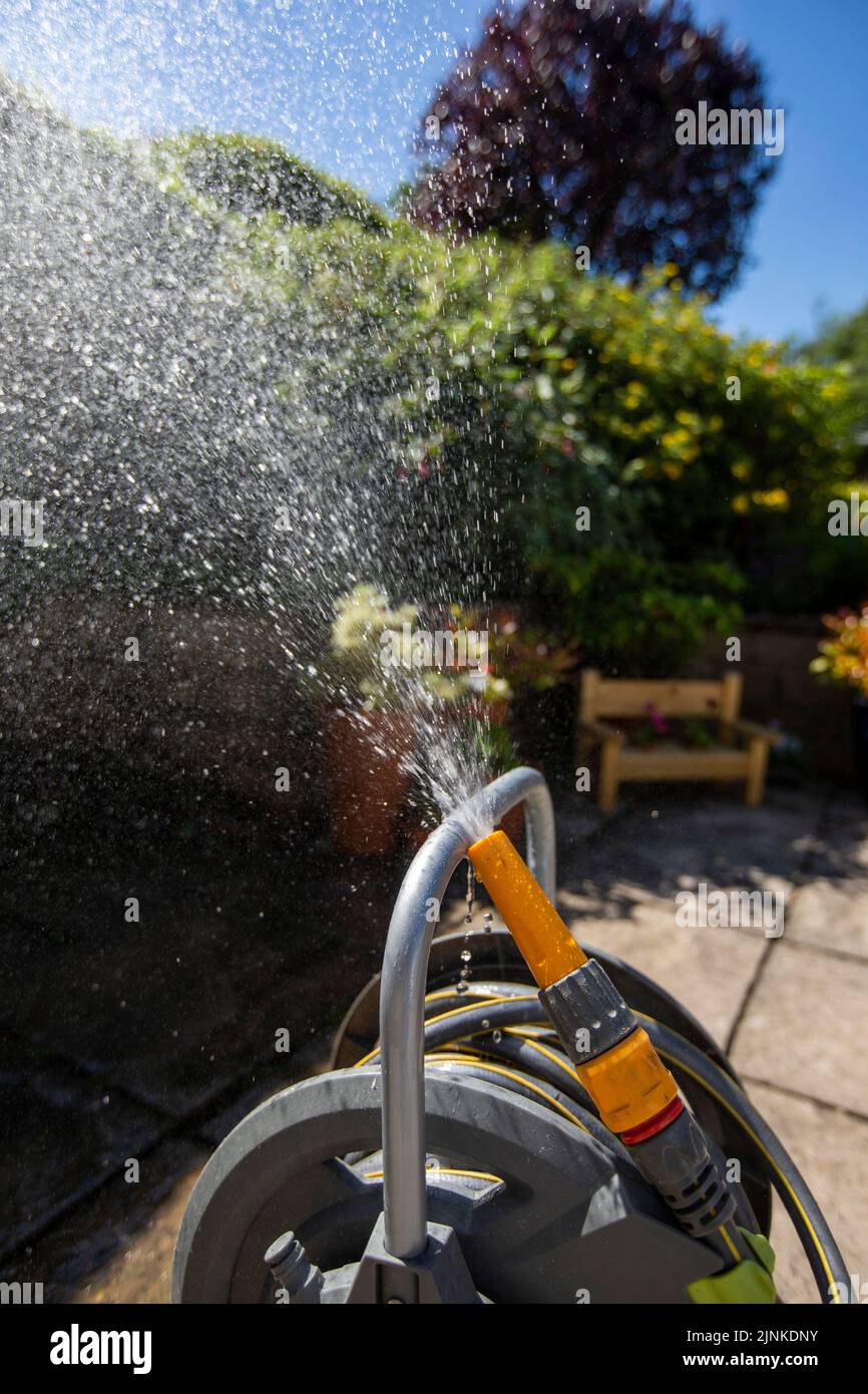 Halifax, West Yorkshire, UK. 12th Aug, 2022. A hose pipe in a West