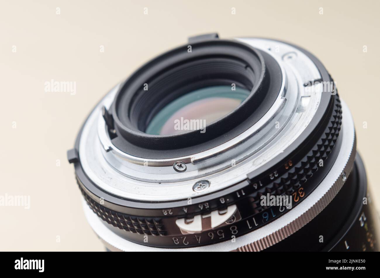 Nikon MicroNIKKOR 105mm 2.8 manual focus lens, back view Stock Photo