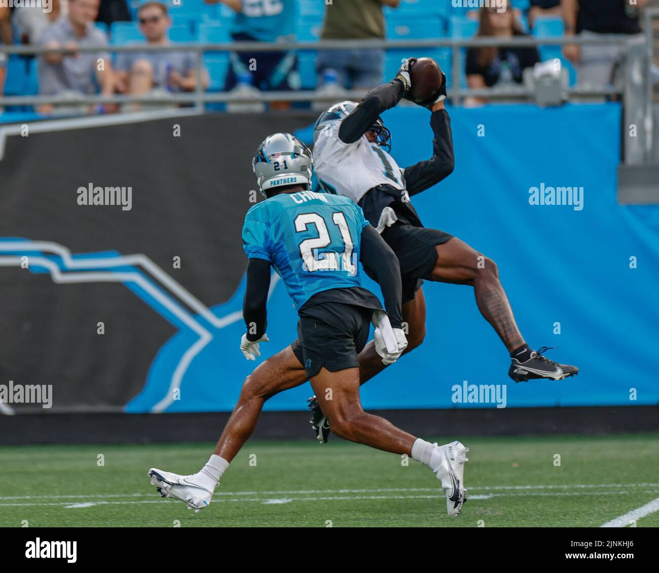 Charlotte, United States. 11th Aug, 2022. Charlotte, NC, USA: Carolina Panthers wide receiver Shi Smith (12) makes a reception while covered by safety Jeremy Chinn (21) during Fan Fest at Bank of America Stadium, Thursday, Aug. 11, 2022, in Charlotte, NC. (Brian Villanueva/Image of Sport) Photo via Credit: Newscom/Alamy Live News Stock Photo