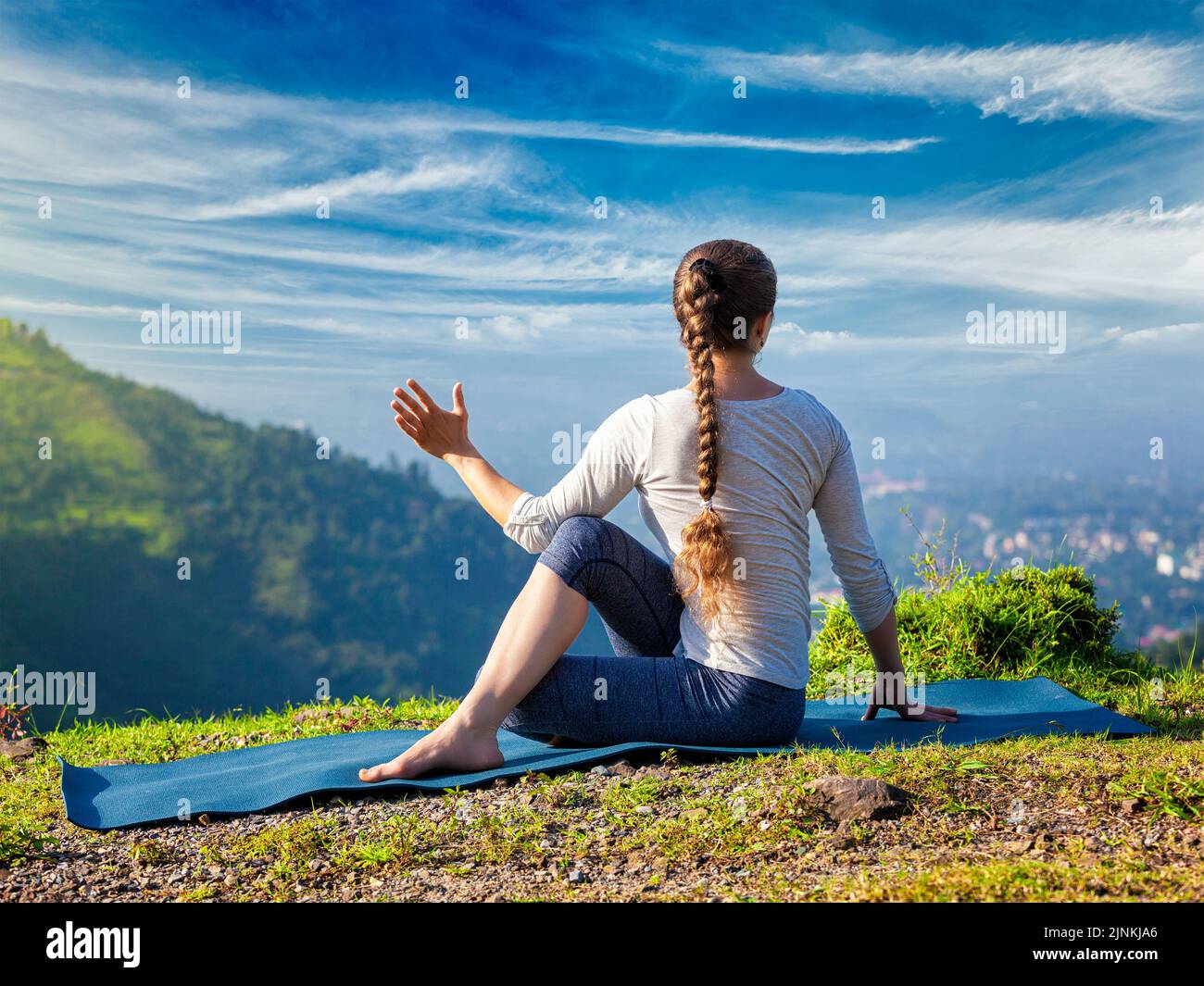 yoga, asana, ardha matsyendrasana, outdoor yoga, yogas Stock Photo Alamy