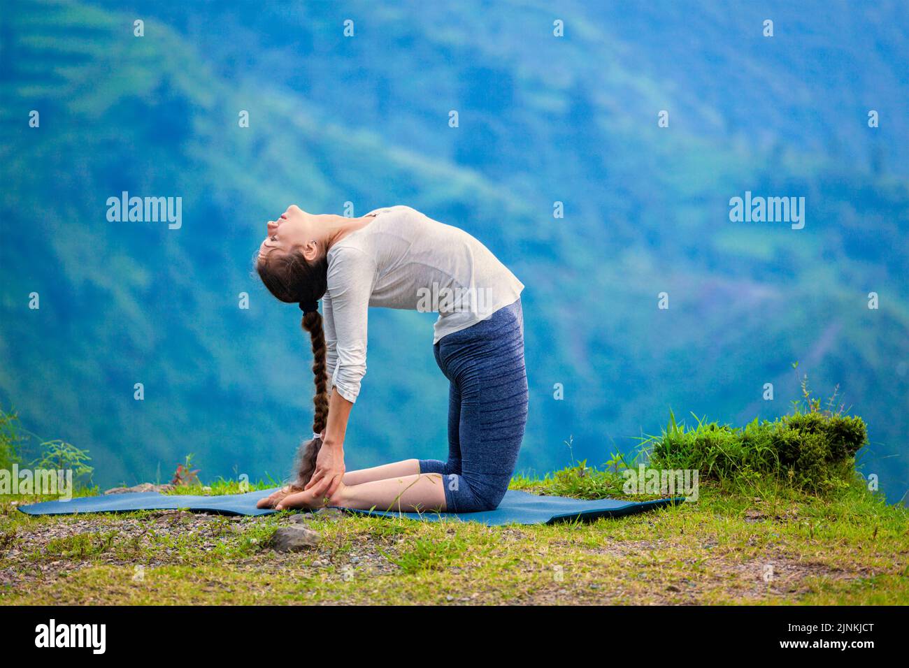 yoga, back bending, flexibility, ustrasana, outdoor yoga, yogas, backbend, backbends Stock Photo