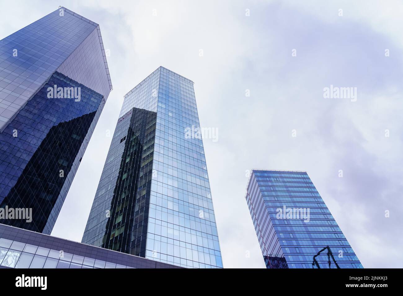 Glass and steel skyscrapers over stormy cloudy sky. Tallinn Estonia ... - Scandianvian Architectural Stack To Sky Glass