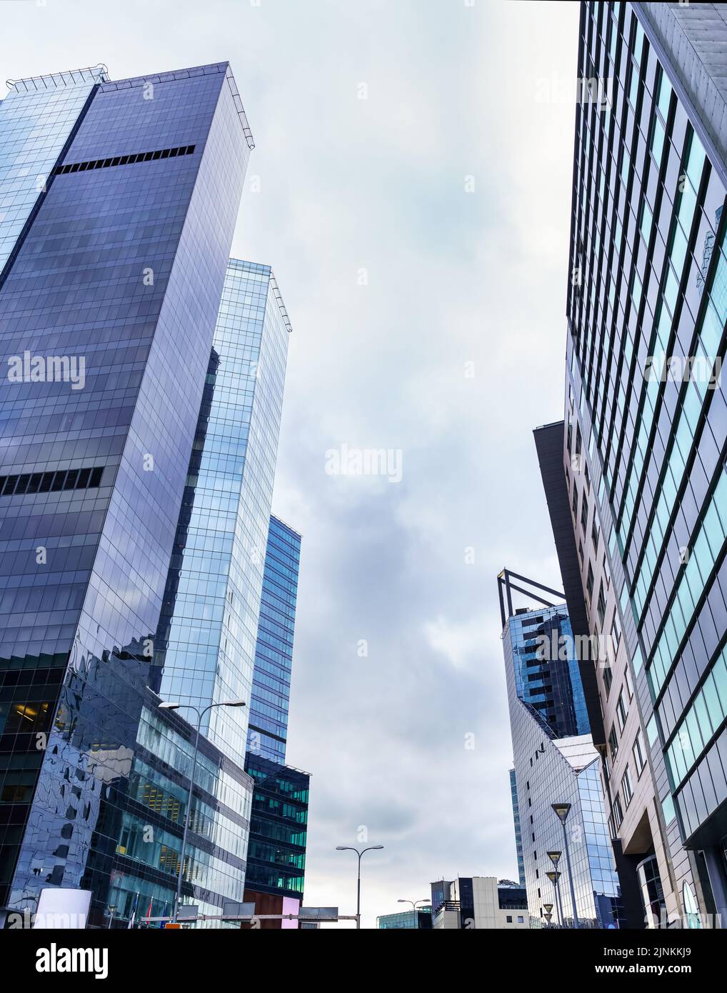 View of Glass and steel skyscrapers over stormy cloudy sky. Tallinn Estonia ...
