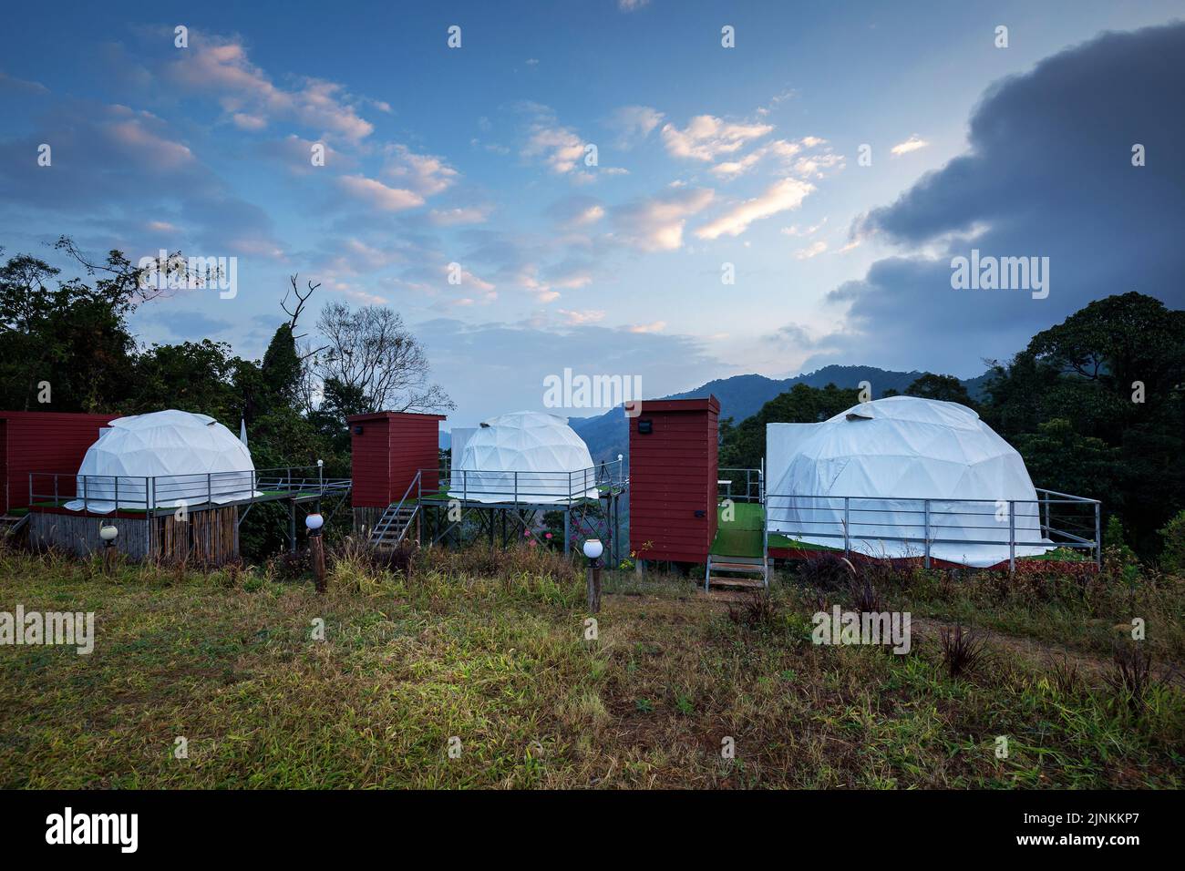 white dome tent a modern design for living lifestyle and farm with green location near mountain background nature Stock Photo
