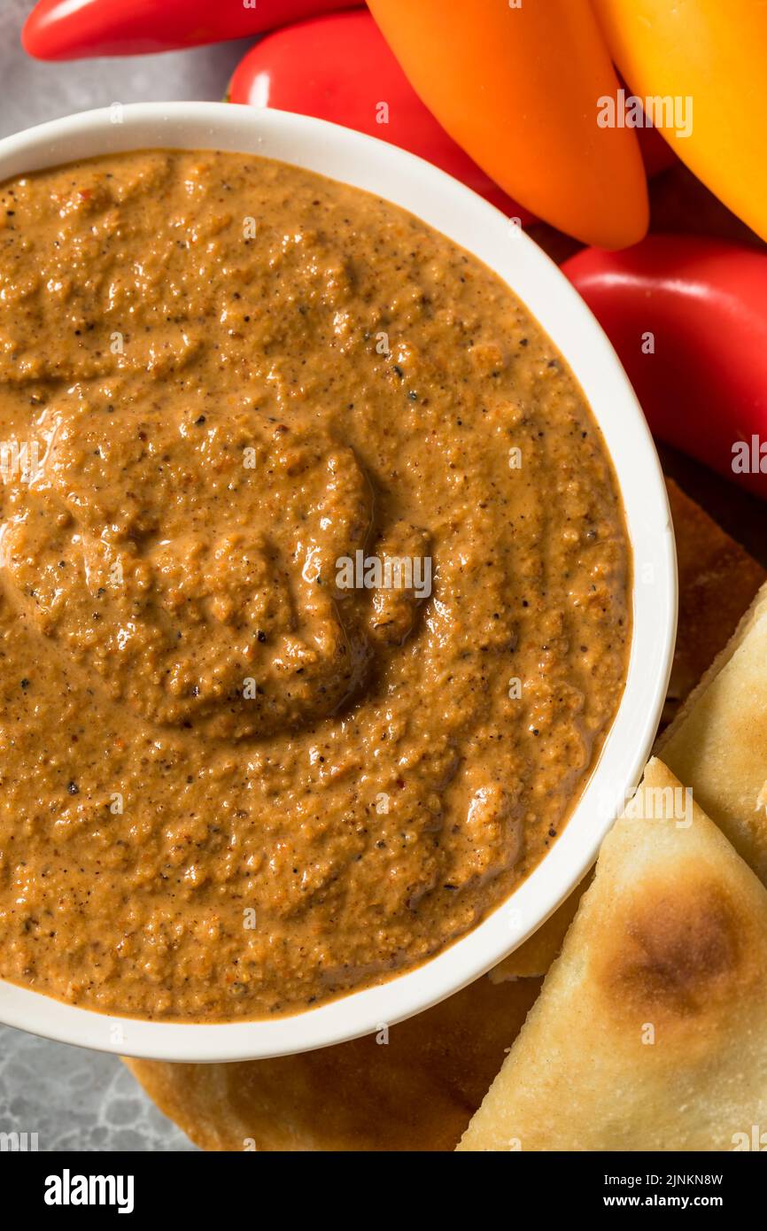 Healthy Homemade Muhammara Dip with PIta and Peppers Stock Photo