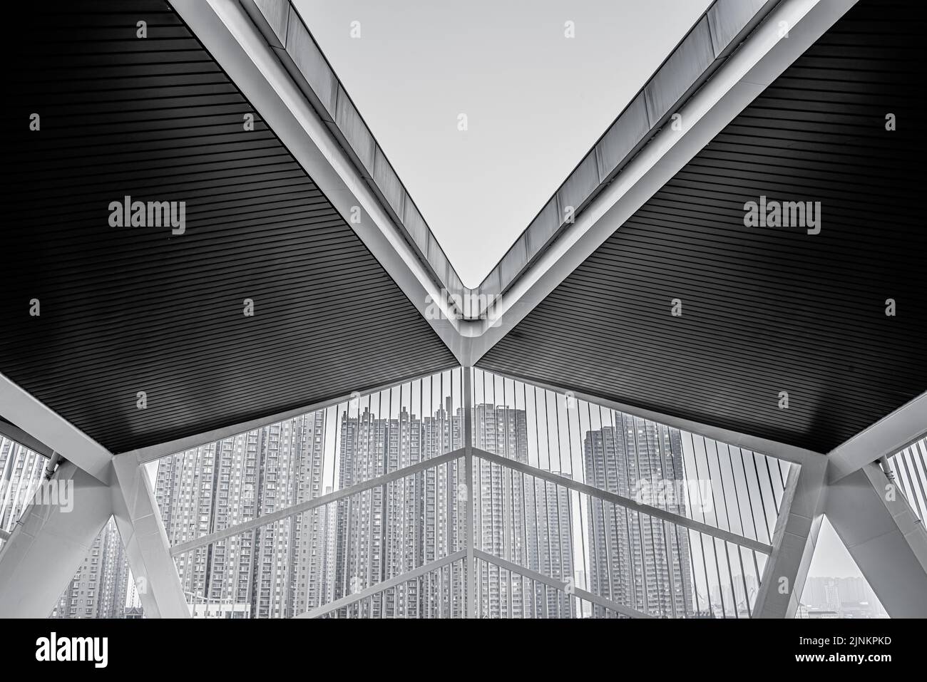 Black and white photos of sky, roof and tall buildings Stock Photo - Alamy