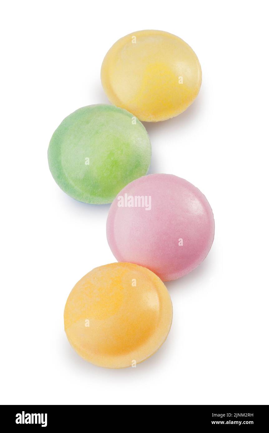 Studio shot of sherbet flying saucer sweets cut out against a white background - John Gollop Stock Photo