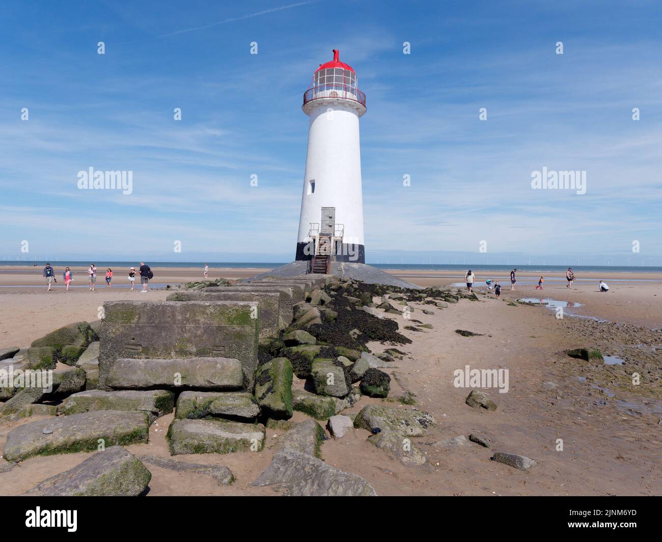 Talacre, Flintshire, Wales, Aug 07 2022: Point of Ayr Lighthouse aka Talacre Lighthouse, a Grade II listed building situated on the beach. Stock Photo