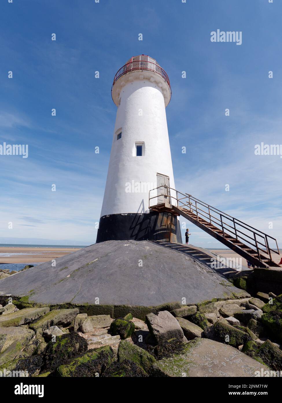 Talacre, Flintshire, Wales, Aug 07 2022: Point of Ayr Lighthouse aka Talacre Lighthouse, a Grade II listed building situated on the beach. Stock Photo