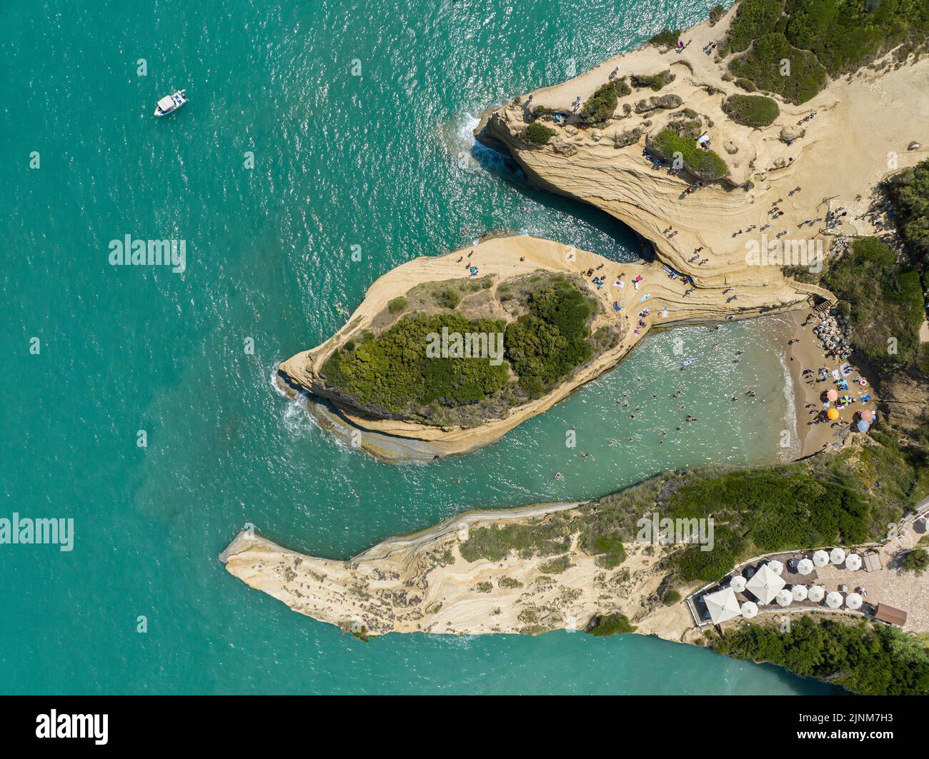 Aerial view of the promontory of Sidari in the northern part of the island of Corfu, Greece. Canal D'Amour cliffs. Bathers on the rocks Stock Photo