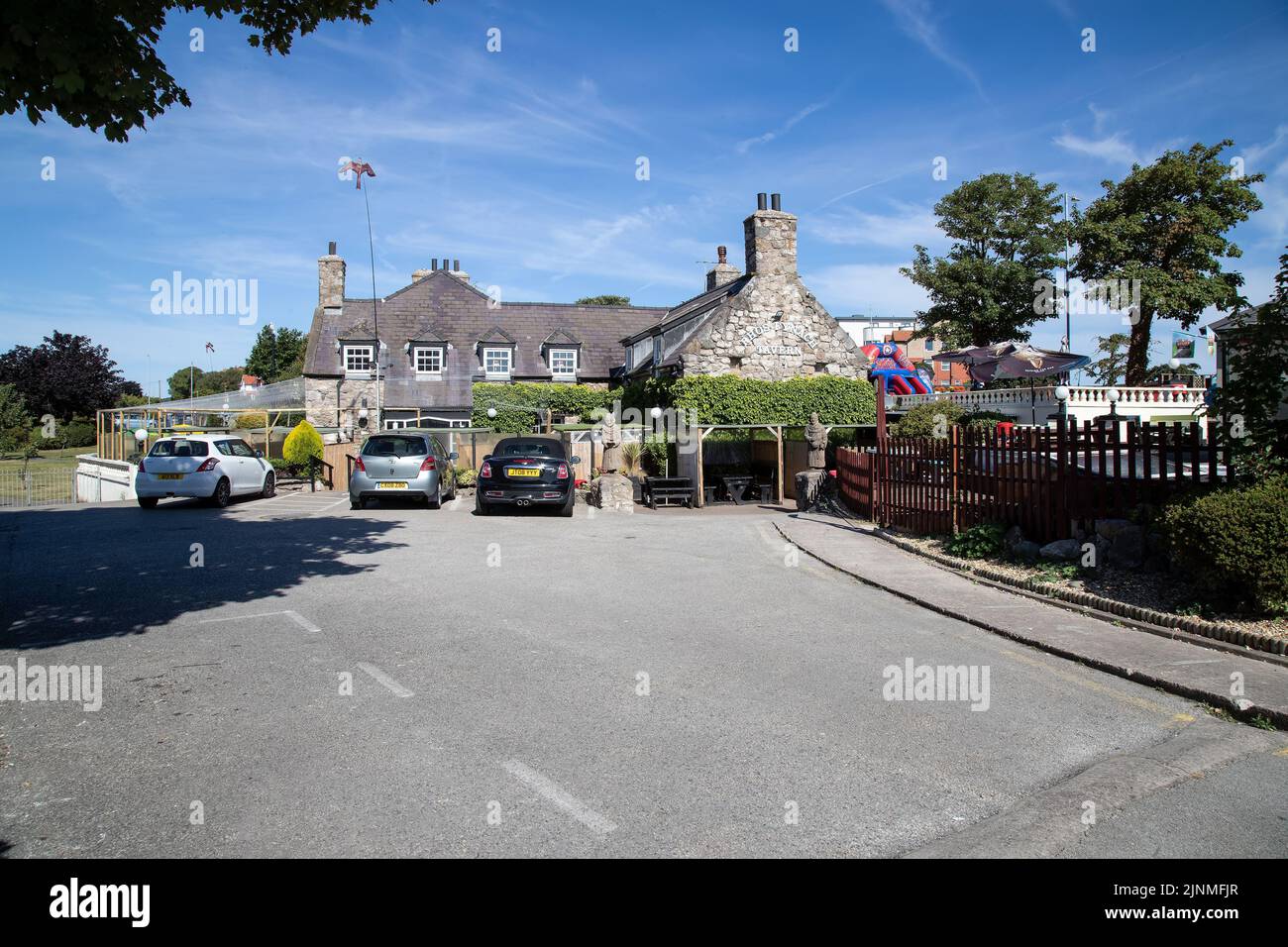 The Rhos Fynach Tavern meaning 'Monk's Marsh' a restored pub originally a 12th century monastery home to the monks who fished the weir off Rhos Point. Stock Photo