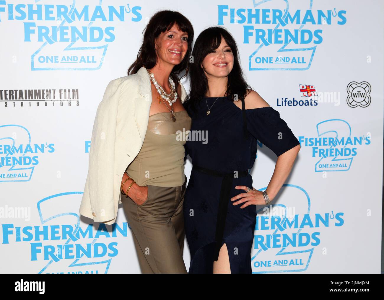 Newquay. Cornwall. UK. Meg Leonard and Imelda May    at the Fisherman's Friends: One and All premiere. Lighthouse Cinema. 9th August 2022. Ref:LMK11-SLIVE090822-001 Steve Bealing/Landmark Media. Stock Photo