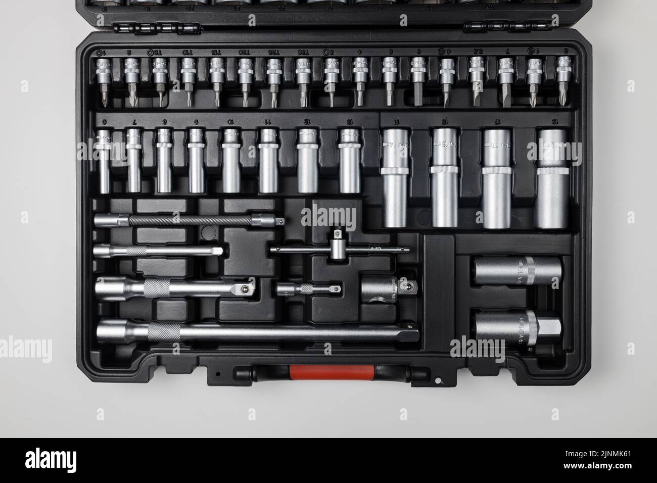 Wrenches of different sizes with different hex heads in a black box on