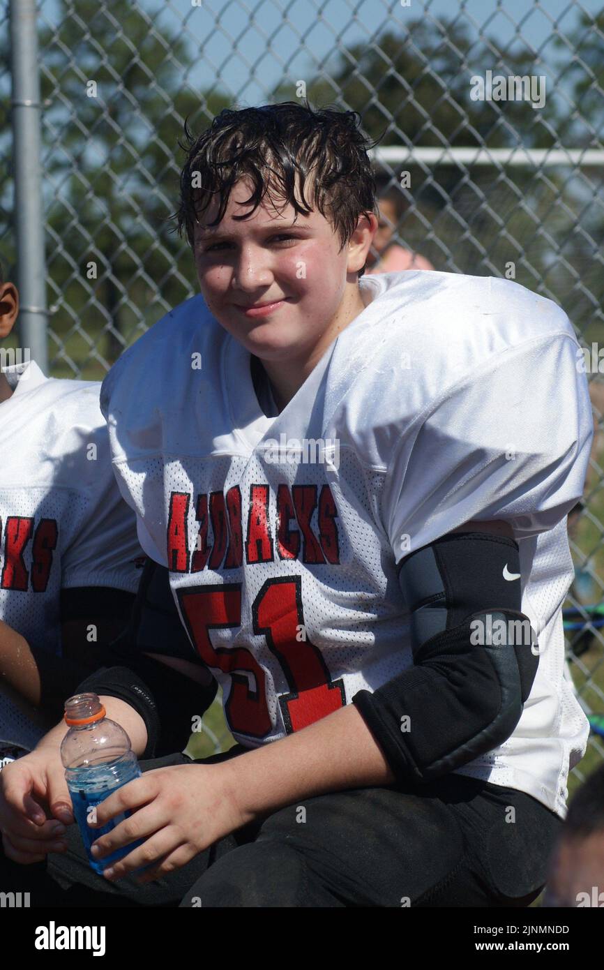 Youth football game, Razorbacks, cooling off halftime Stock Photo Alamy