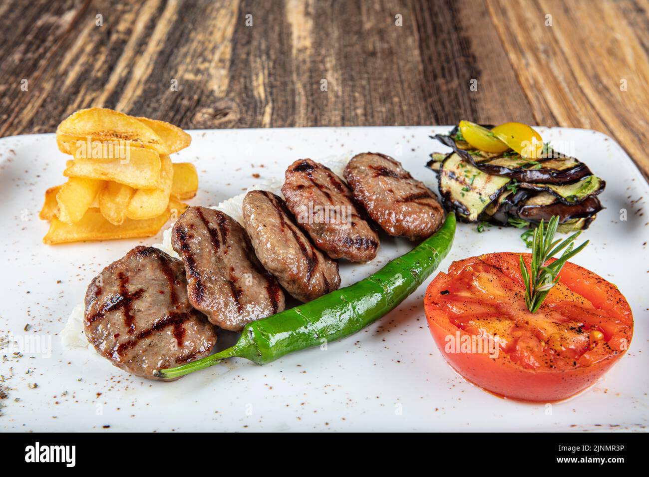 Turkish Food Meatball Kofte Kofta With Tomatoes And Onion In Plate 