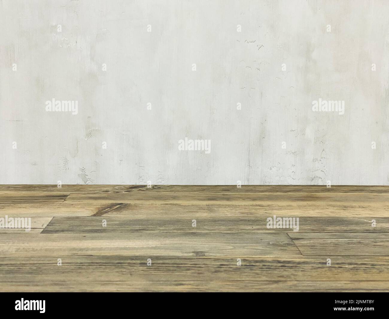 Wooden table and grey wall background Stock Photo