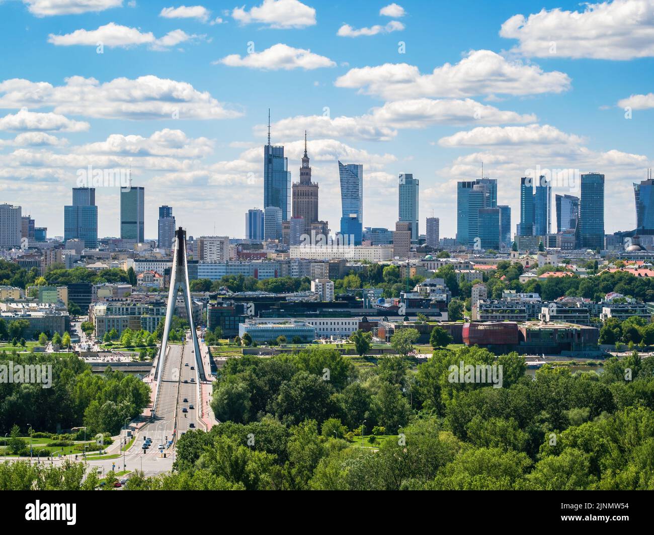 Swietokrzyski bridge and skyscrapers in city center, Warsaw aerial landscape under blue sky Stock Photo