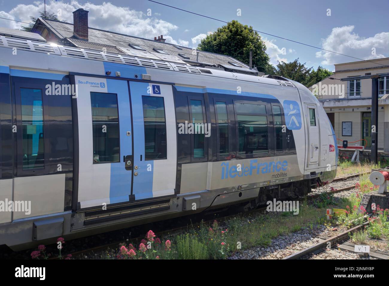 Versailles, France - May 28, 2022: Train at Versailles Rive Droite railway station showing iledeFrance logo Stock Photo