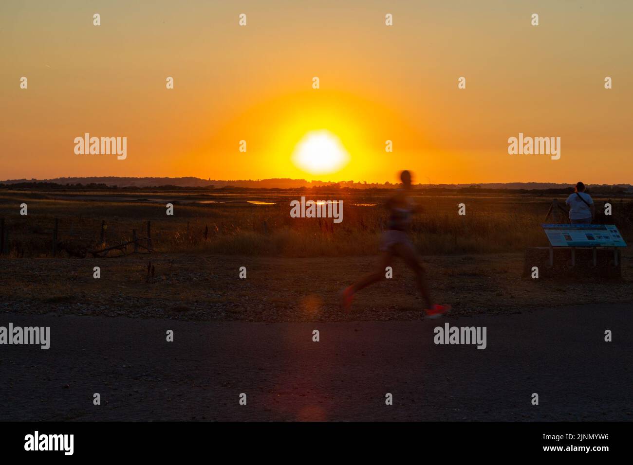 Rye, East Sussex, UK. 12th Aug, 2022. UK Weather: After a hot and sunny day the sun sets over Rye harbour in East Sussex. Photo Credit: Paul Lawrenson /Alamy Live News Stock Photo