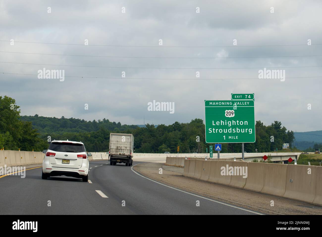 Lehighton, PA - July 28, 2022: Mahoning Valley Exit 74 sign on the Northeast Extension of the Pennsylvania Turnpike for Lehighton and Stroudsburg Rout Stock Photo