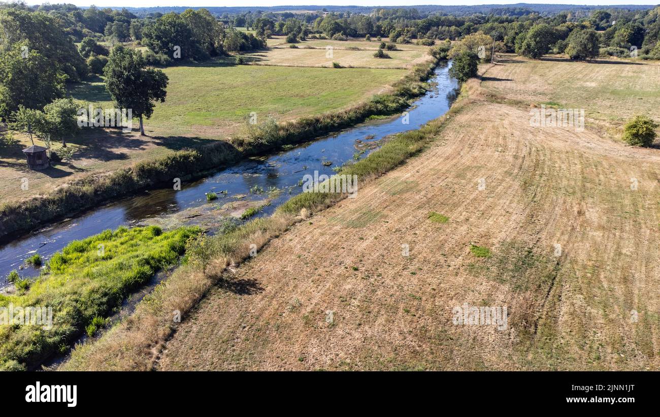 Belgium. 12th Aug, 2022. Illustration picture shows the Semois river in Luxembourg province, Belgium, on Friday 12 August 2022. Severe droughts are effecting Europe since the beginning of the year. Weather forecast services announced an 8 to 10 day long heat wave. BELGA PHOTO BRUNO FAHY Credit: Belga News Agency/Alamy Live News Stock Photo