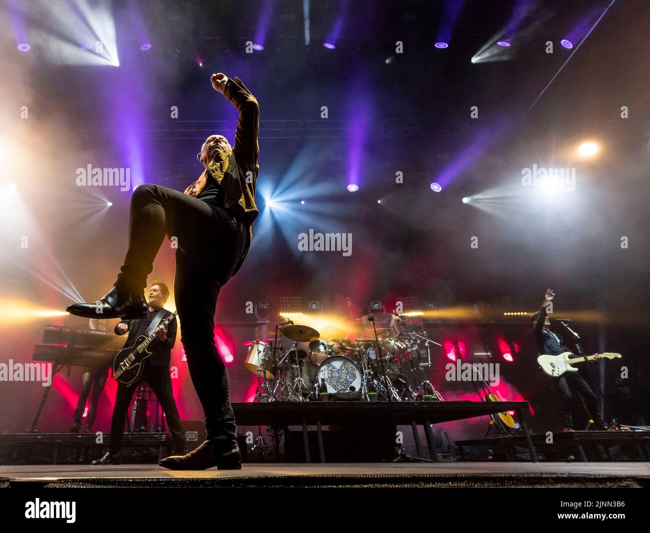 Edinburgh, UK. 12th Aug, 2022. Simple Minds at Princes Street Gardens, Edinburgh on Friday 12th August 2022 as part of the Edinburgh Summer Session concerts.  Band members:  Jim Kerr – lead vocals  Charlie Burchill – electric & acoustic guitar  Ged Grimes – bass guitar  Sarah Brown - backing vocals  Gordy Goudie - additional keyboards & guitar  Cherisse Osei - drums  Berenice Scott - keyboards   Picture: Alan Rennie Credit: Alan Rennie/Alamy Live News Stock Photo