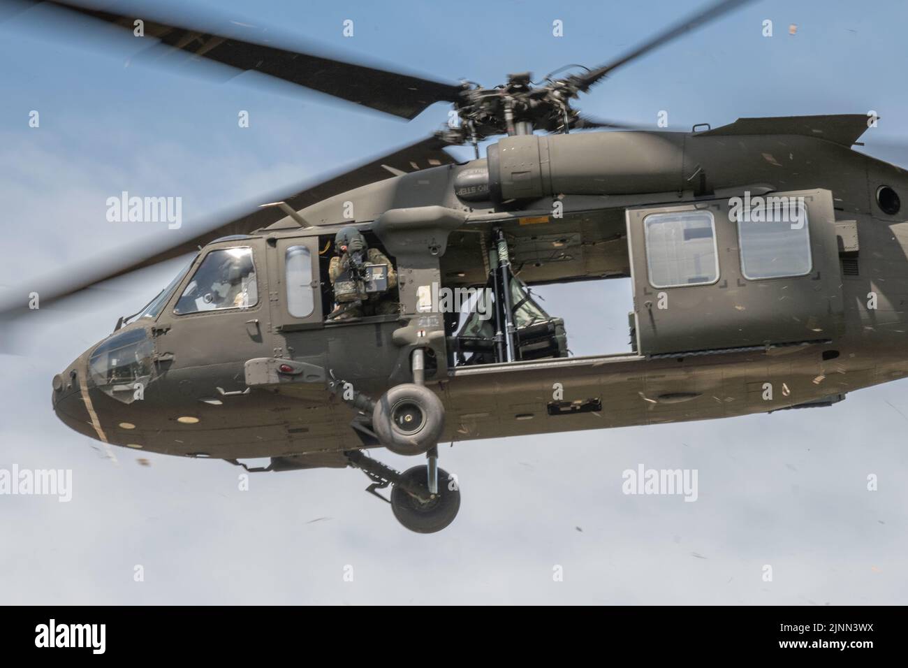 Company B, 1st Battalion, 128th Infantry Regiment, 32nd Infantry Brigade Combat Team and the 1st Battalion, 147th Aviation Regiment and other units from across the Wisconsin National Guard to conduct an air assault mission during annual training June 10 at Fort McCoy, Wis. Stock Photo