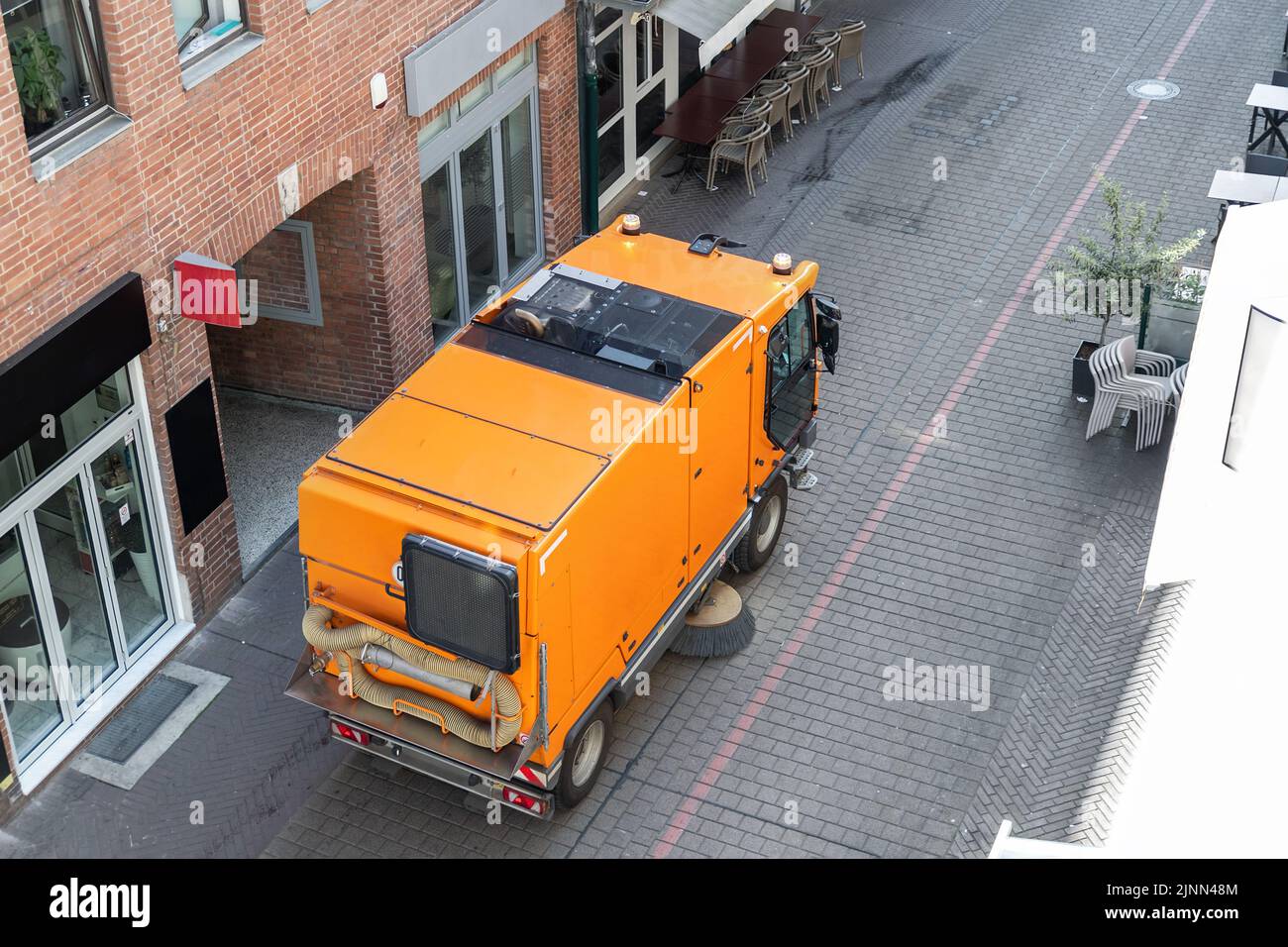 Top above view of small sweeping vacuum cleaner machine equipment