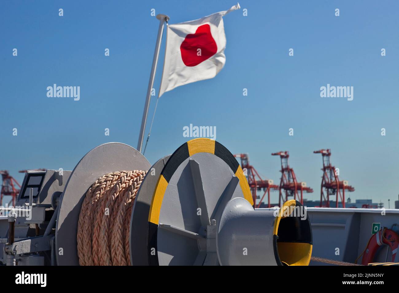 Japanese flag on stern of commercial fishing vessel Tokyo Bay Tokyo Japan Stock Photo